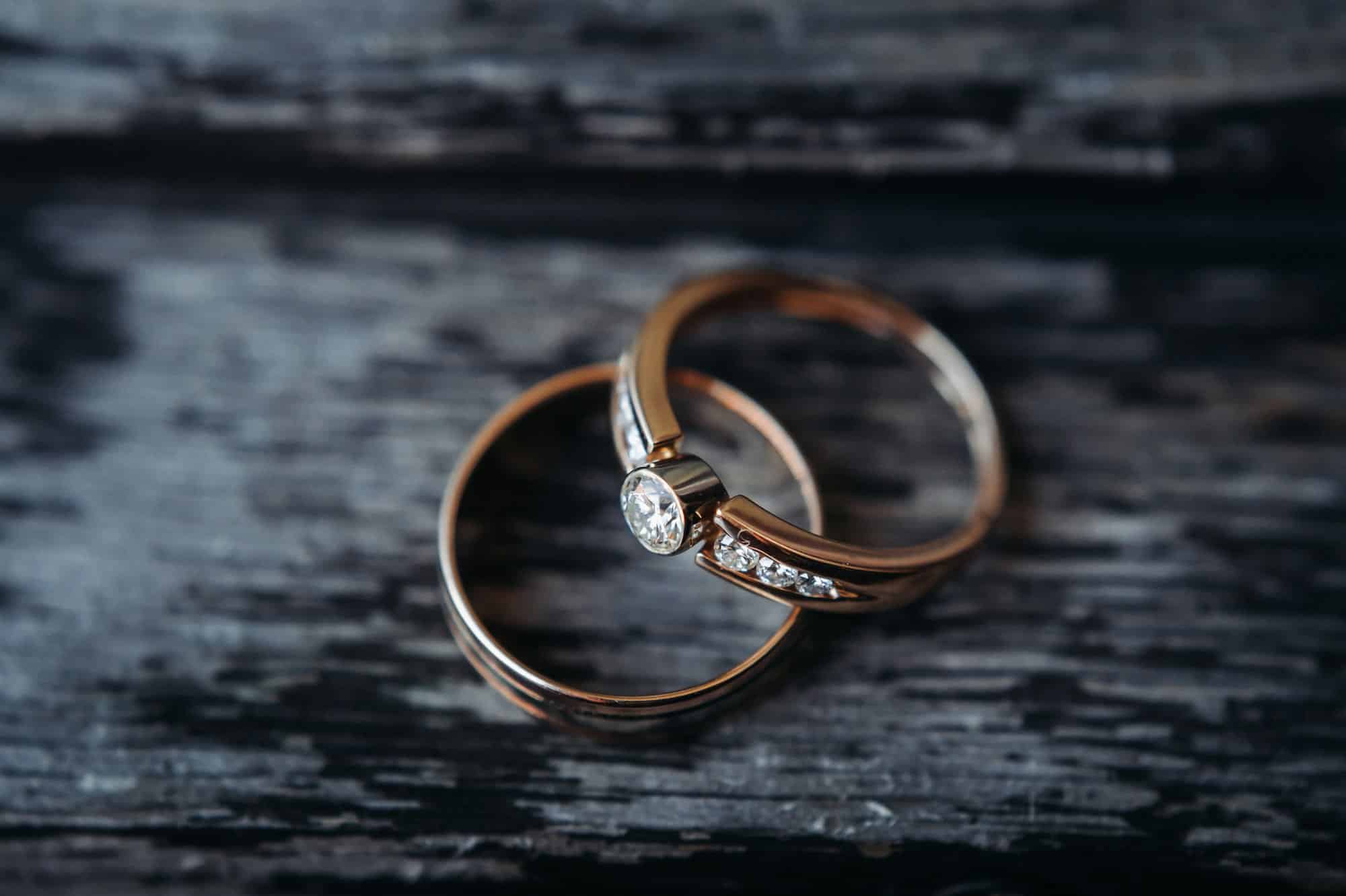 Close-up of two gold wedding rings for a wedding